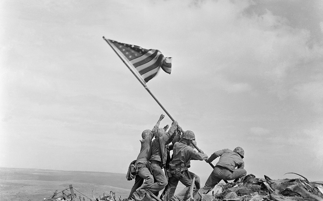 “Raising the Flag on Iwo Jima” (1945) – Joe Rosenthal